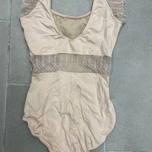 Beautiful pale pink lace cape sleeve leotard